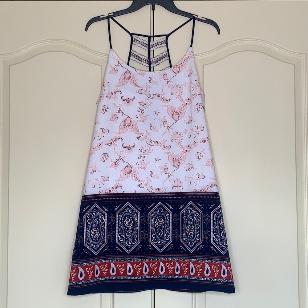 Size M Summer dress with beautiful back detail.
